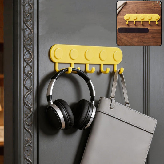 Self-adhesive plastic 5-hook wall hanger in use