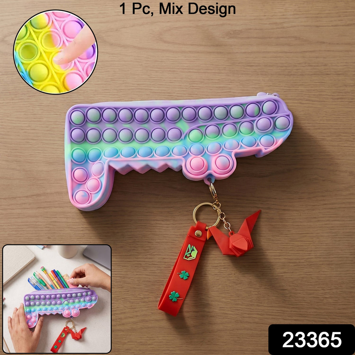Side view of soft silicone push pop bubble pencil case with keychain charm.