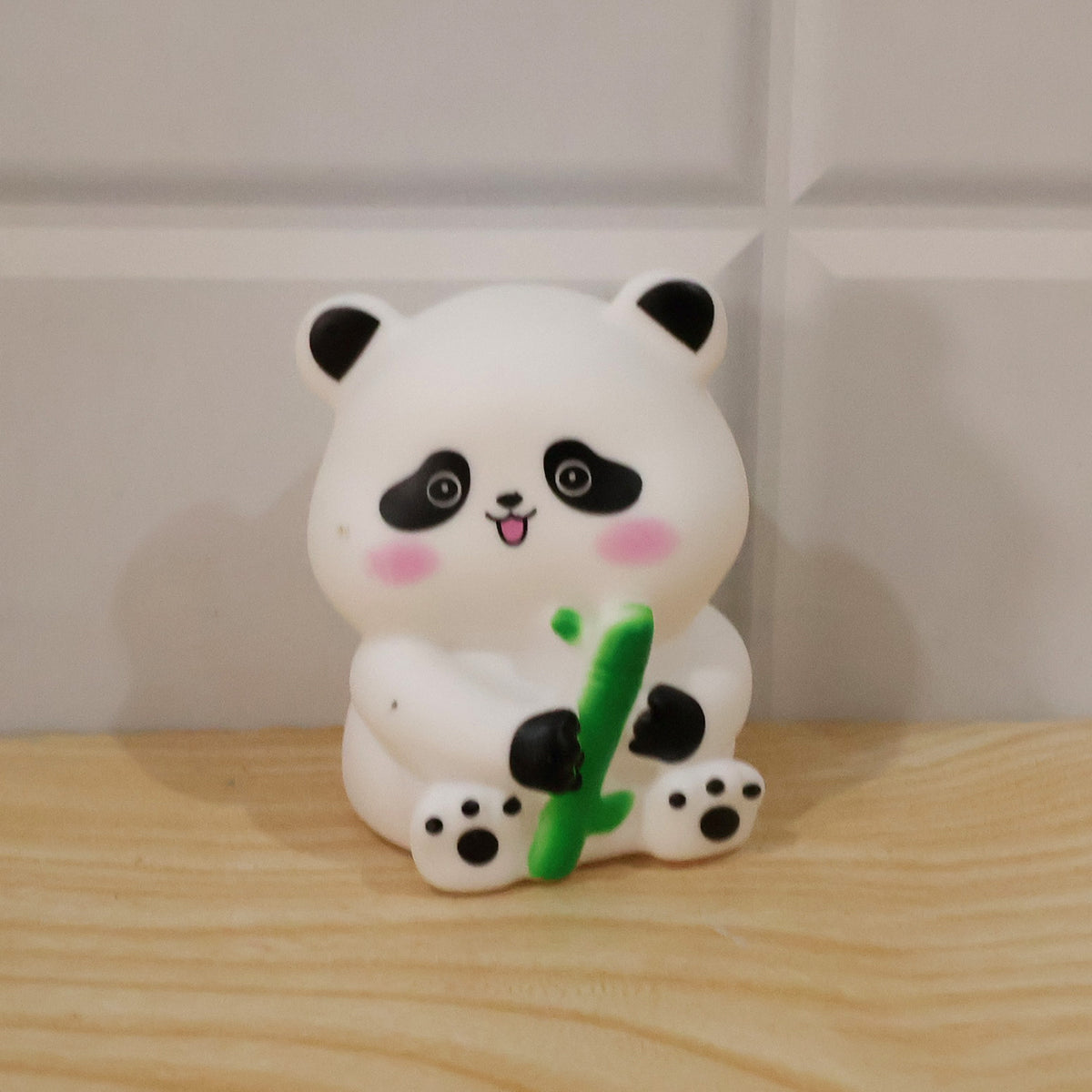 Actual photograph of panda hugging bamboo night lamp