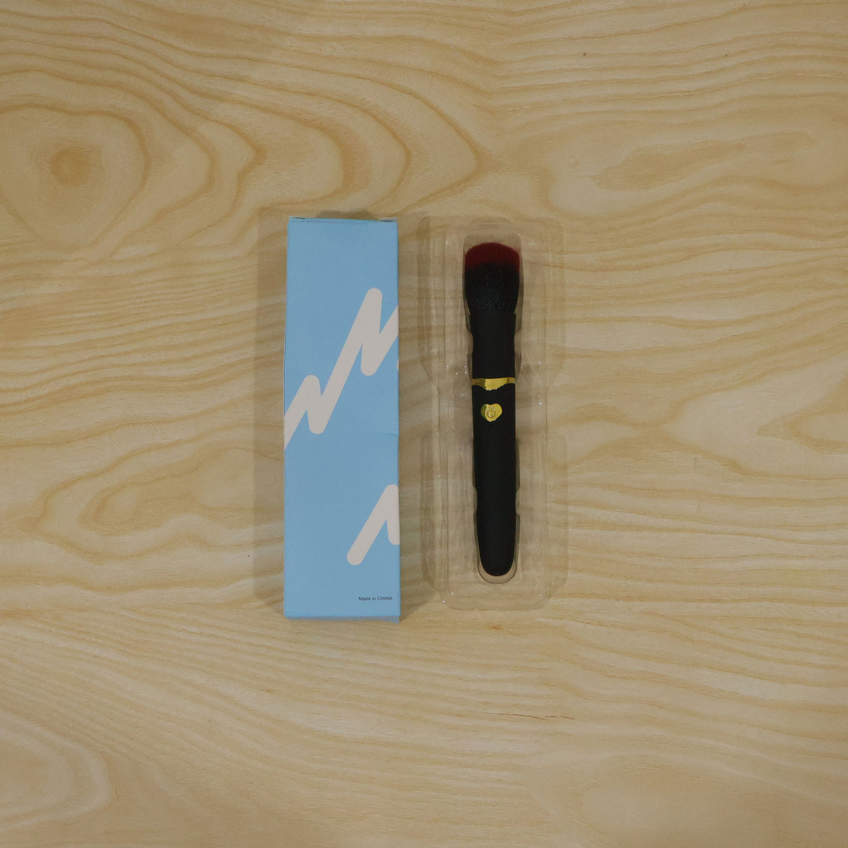 Actual photograph of makeup brush and box