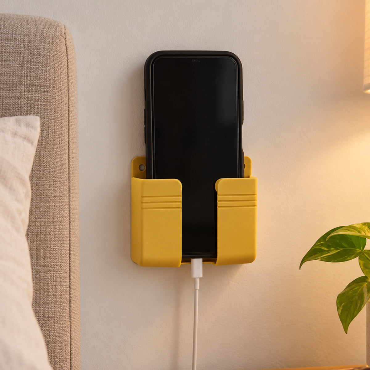 Wall mounted mobile phone holder with adhesive pad 1