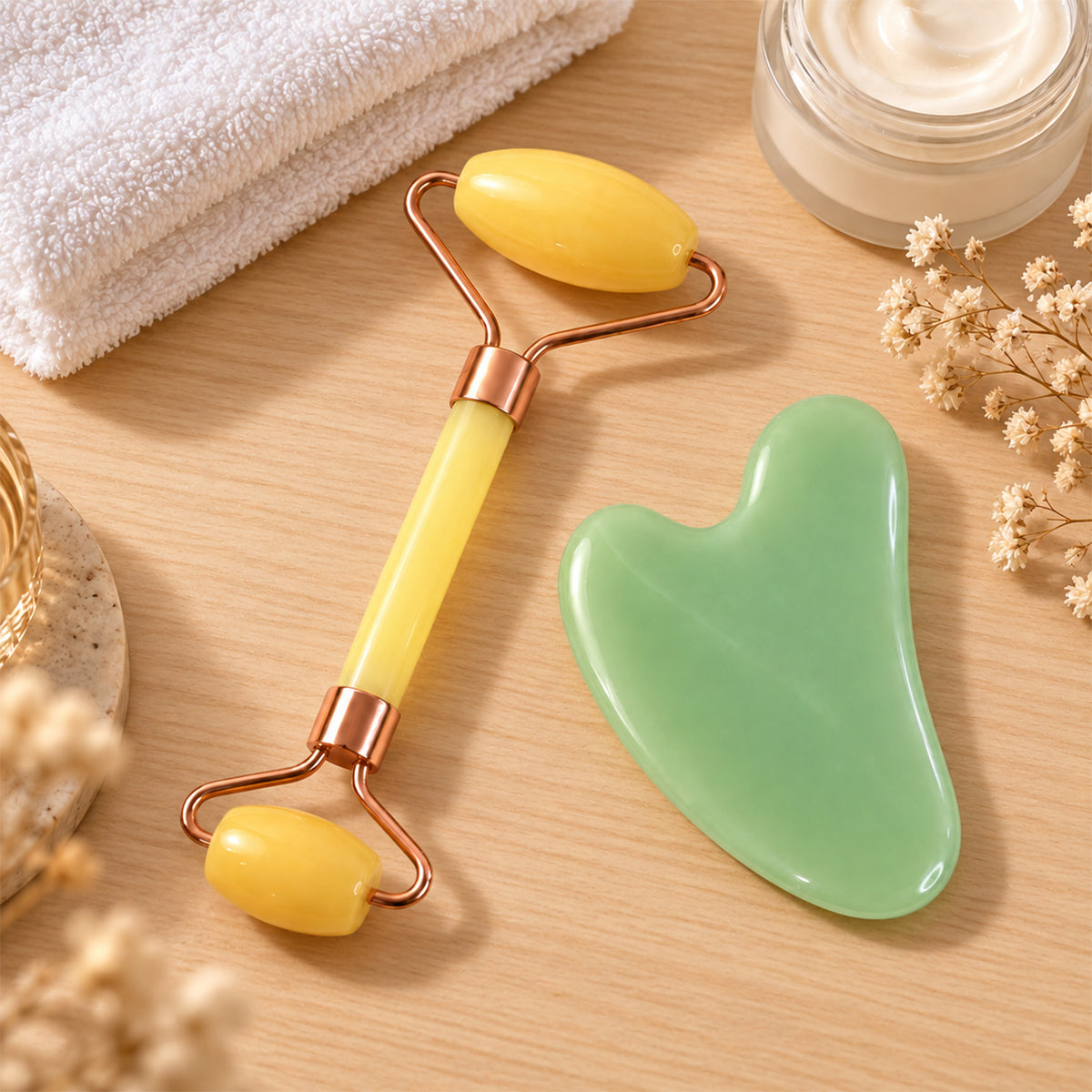 Facial roller and curved gua sha displayed together