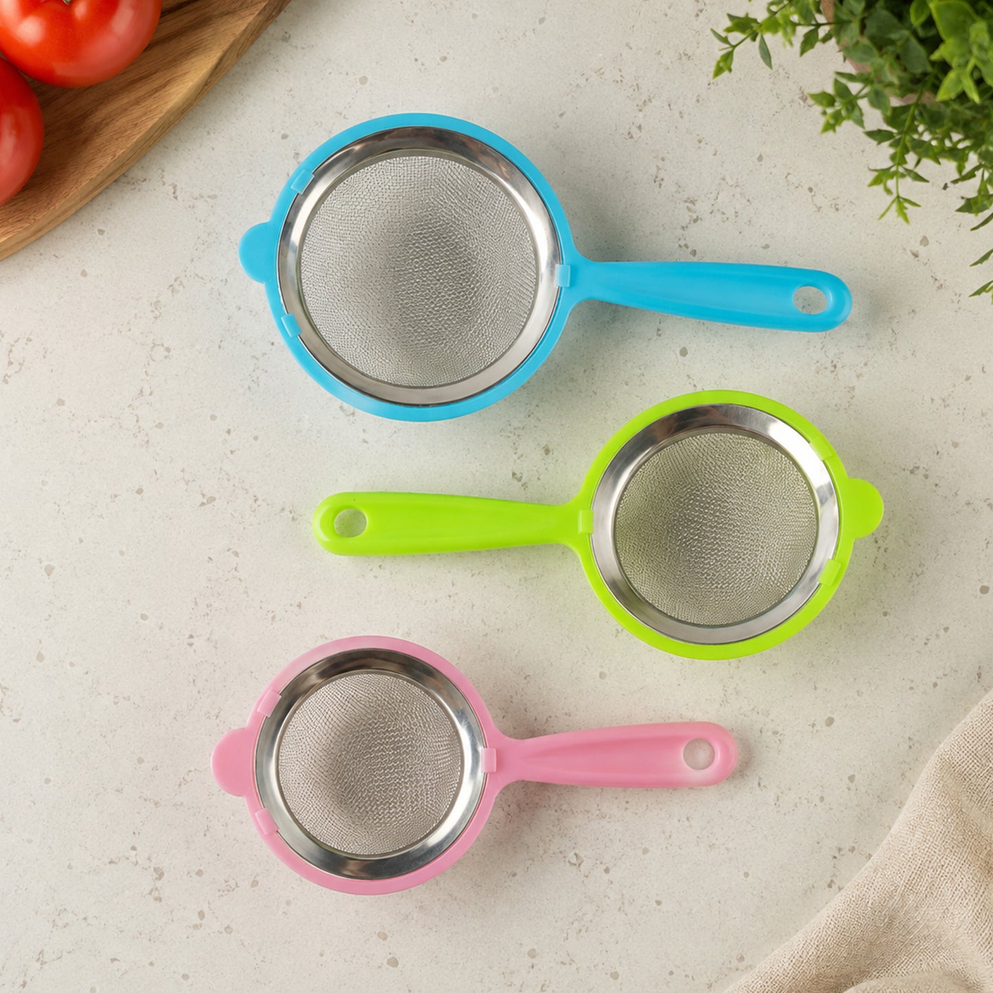 Three mesh tea strainers in assorted sizes