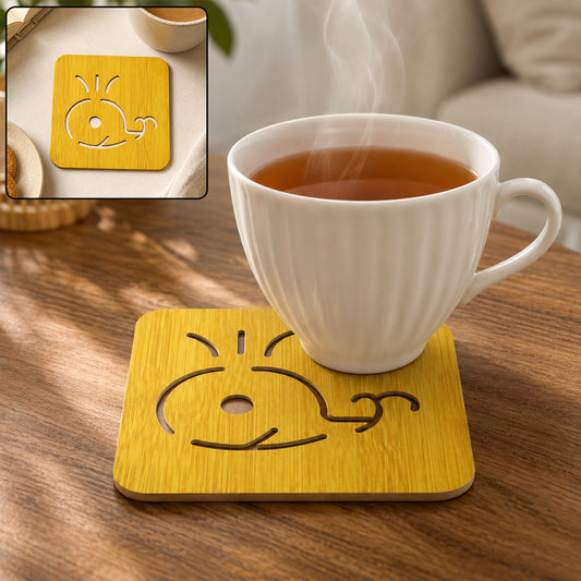 Square wooden whale design coaster in use