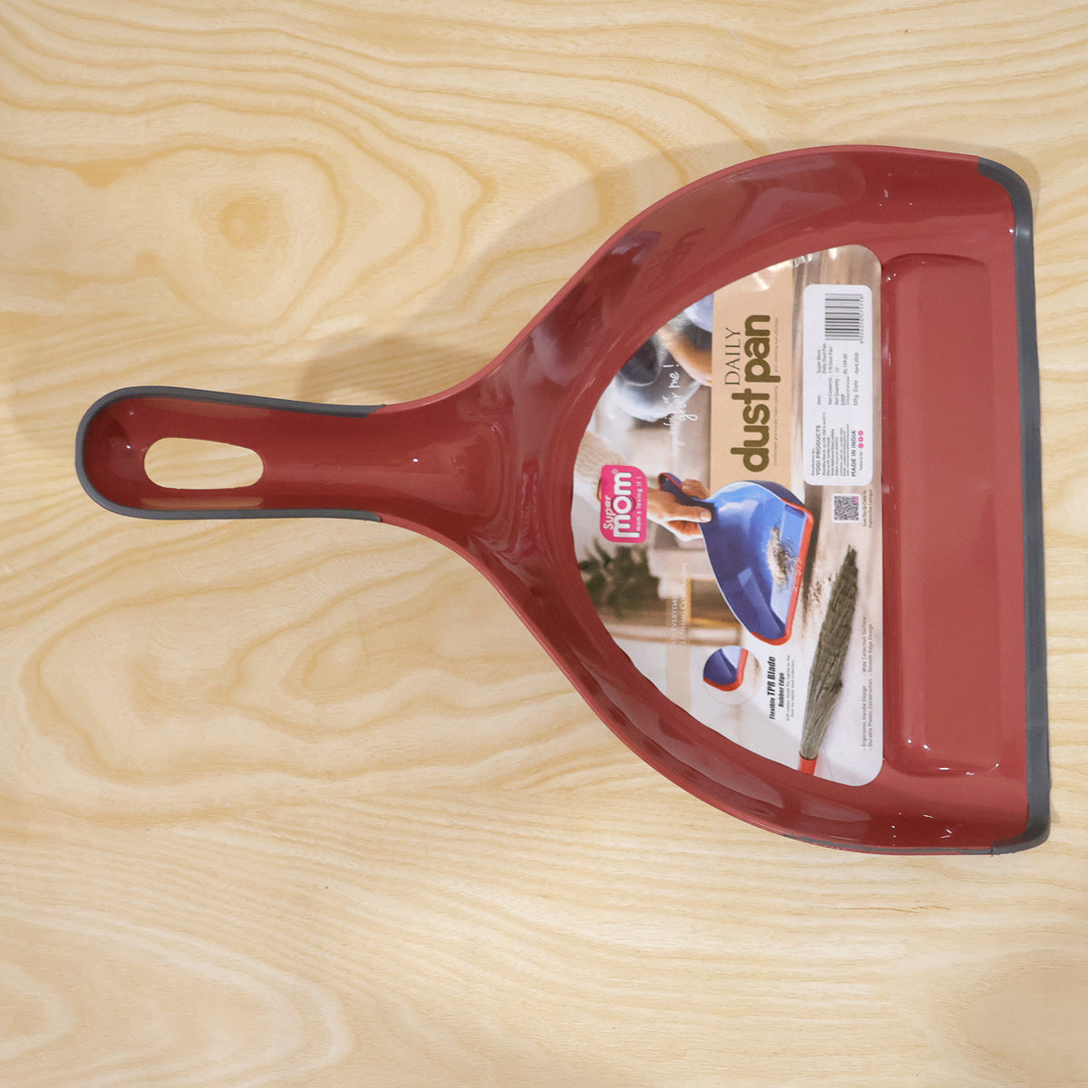 Dust pan with flexible front edge and hanging handle 10