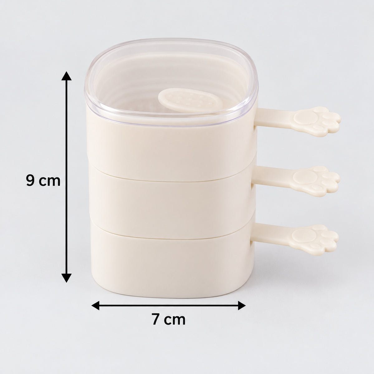 A side view of three stacked square molds with paw handles, showing dimensions of 9 cm height and 7 cm width.
