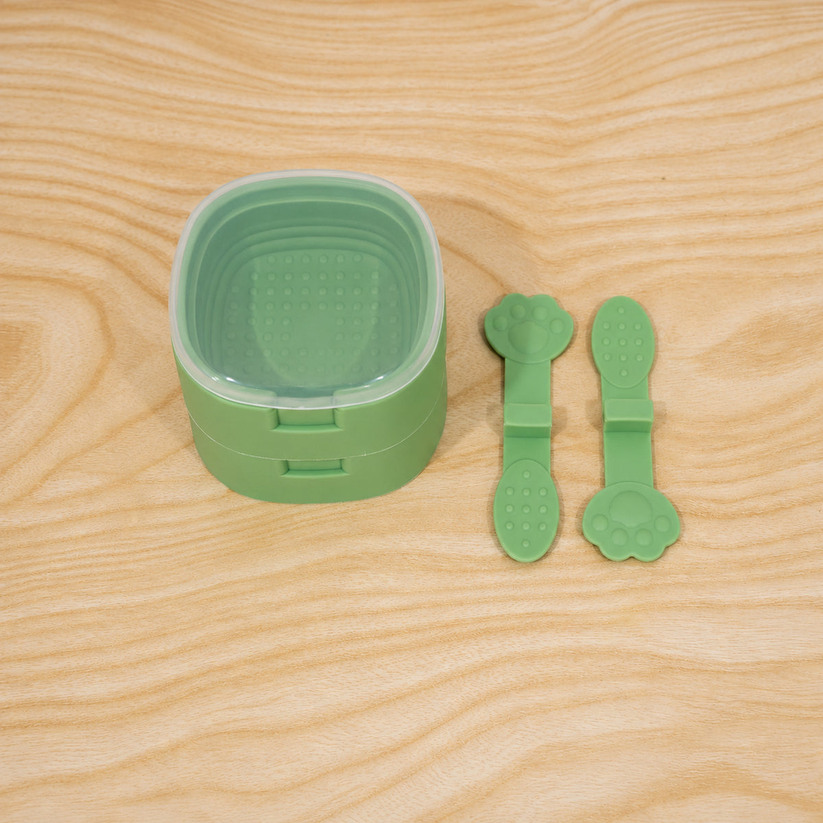 Green square ice cream mold with a single frozen dessert