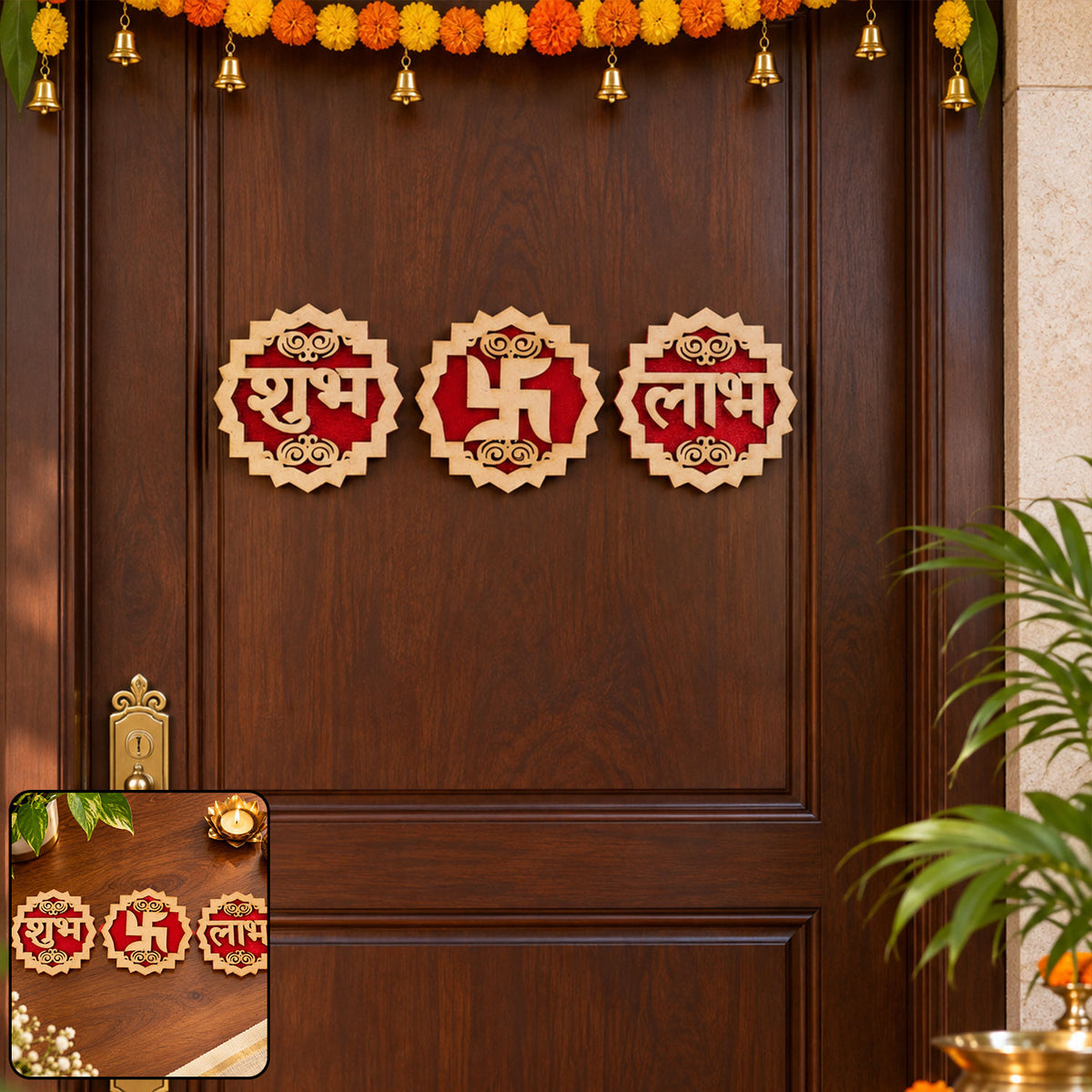 Three wooden and red velvet Shubh Labh Swastik decorations are displayed on a dark brown door, with a small inset showing