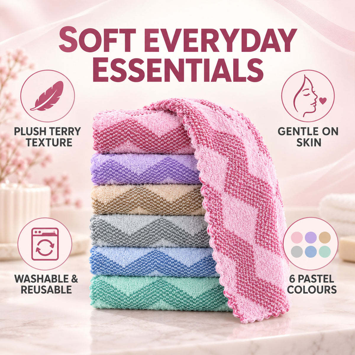 A stack of six pastel chevron-patterned face towels, with a pink towel draped over the top, on a light surface.