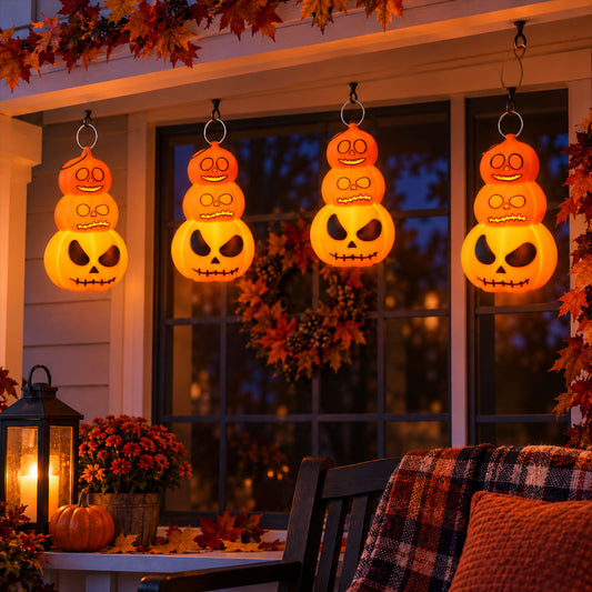 Four Halloween 3 Layer Pumpkin LED Hanging Lights with warm orange glow