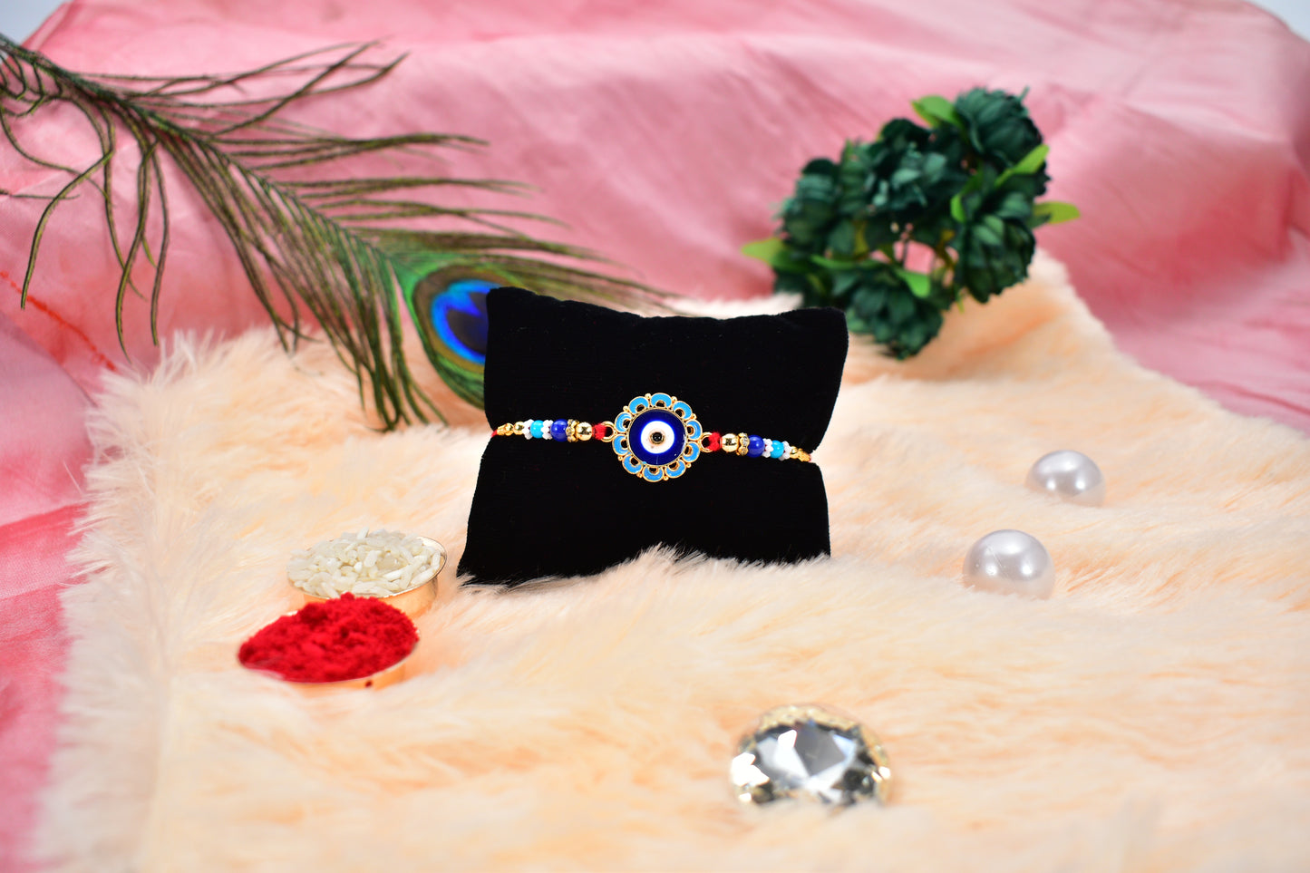 Evil Eye Rakhi with Blue Beads and Golden Accents โ Protective Nazar Design