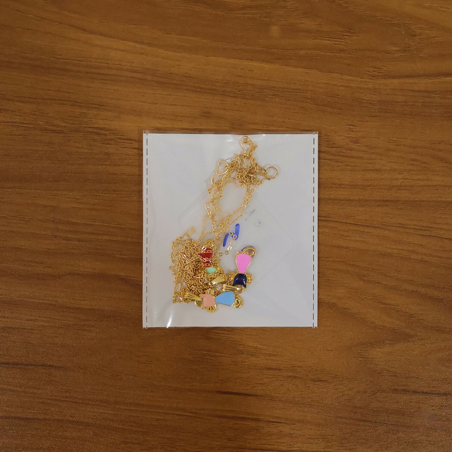 Gold cat pendant necklace packaging and presentation
