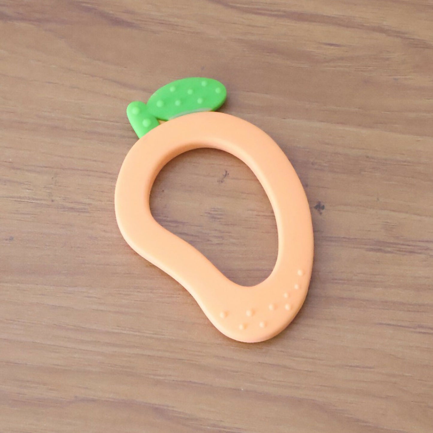 Mango-shaped silicone baby teether