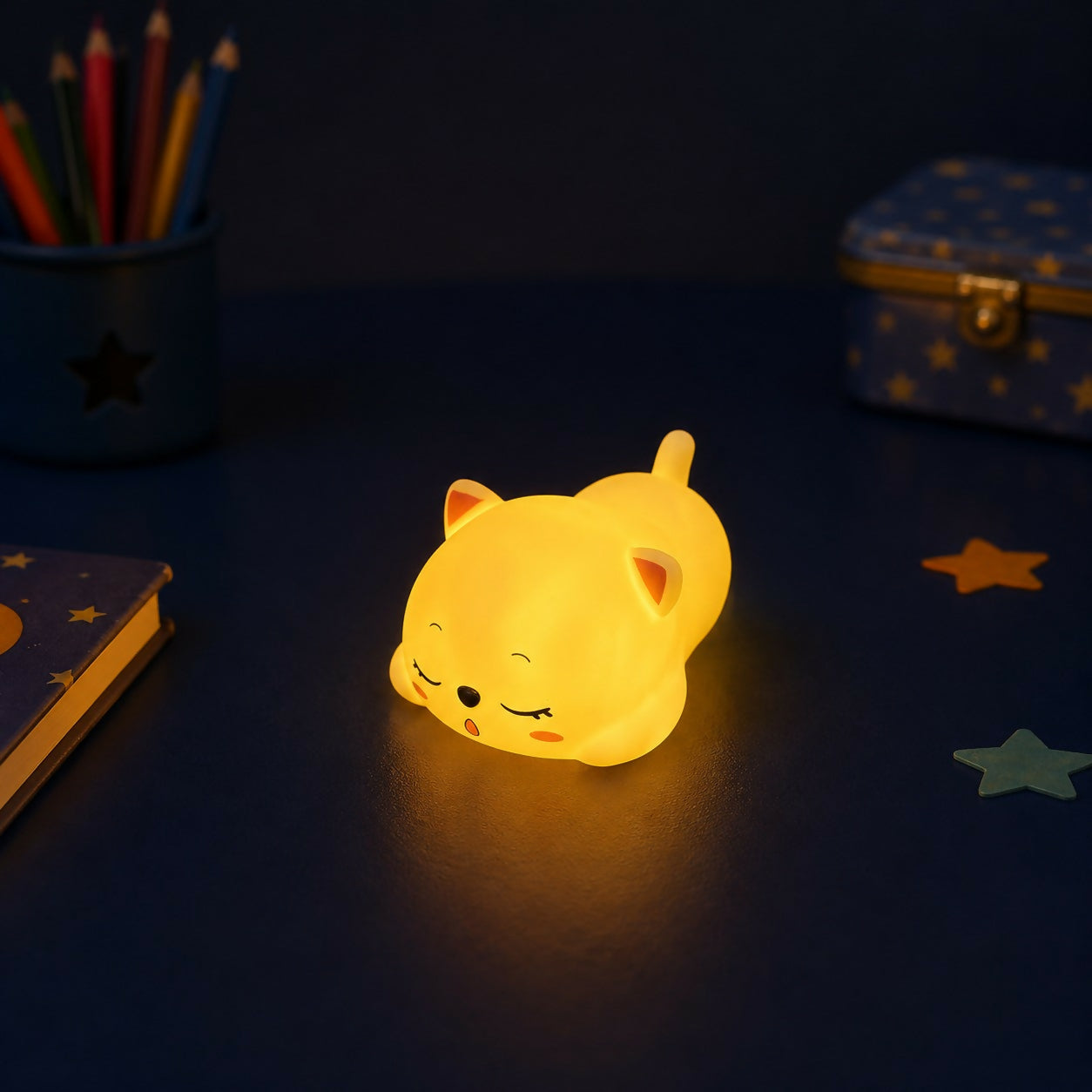 Sleeping cat silicone night lamp on bedside table