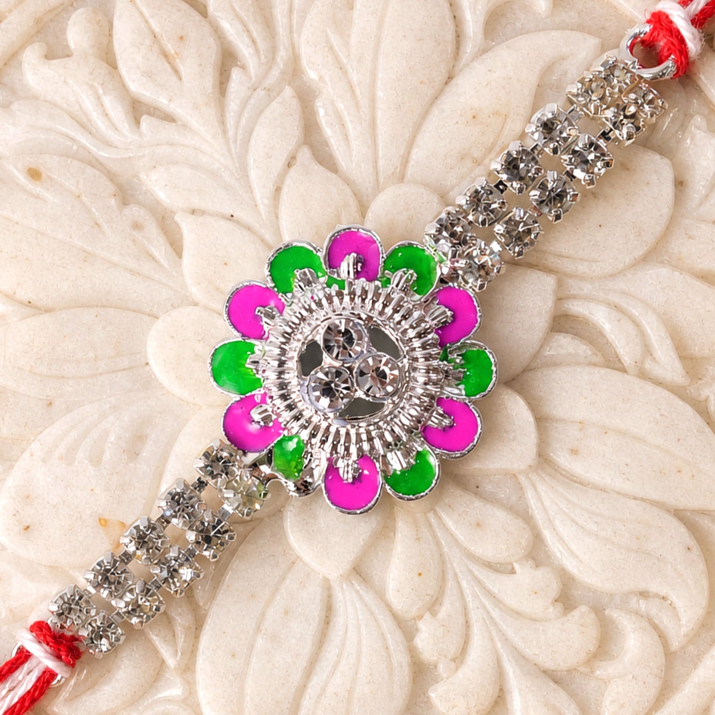 Designer Rakhi featuring Floral Medallion, gold trims and display look for Gift Use