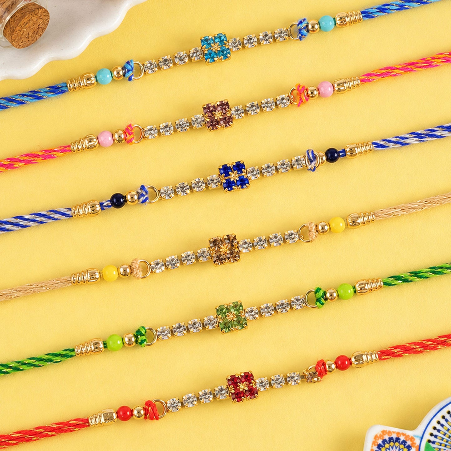 Square Motif Stone Band Rakhi in Mix Colour Threads (Pack of 6)