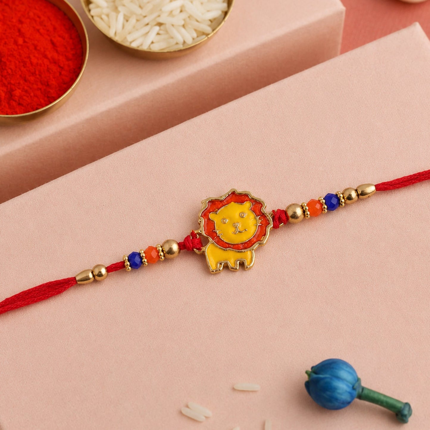 The lion Kids Rakhi shown from another angle, emphasizing its playful and adorable design.