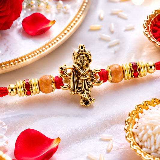 Krishna Flute Rakhi with golden idol centre and wooden beads