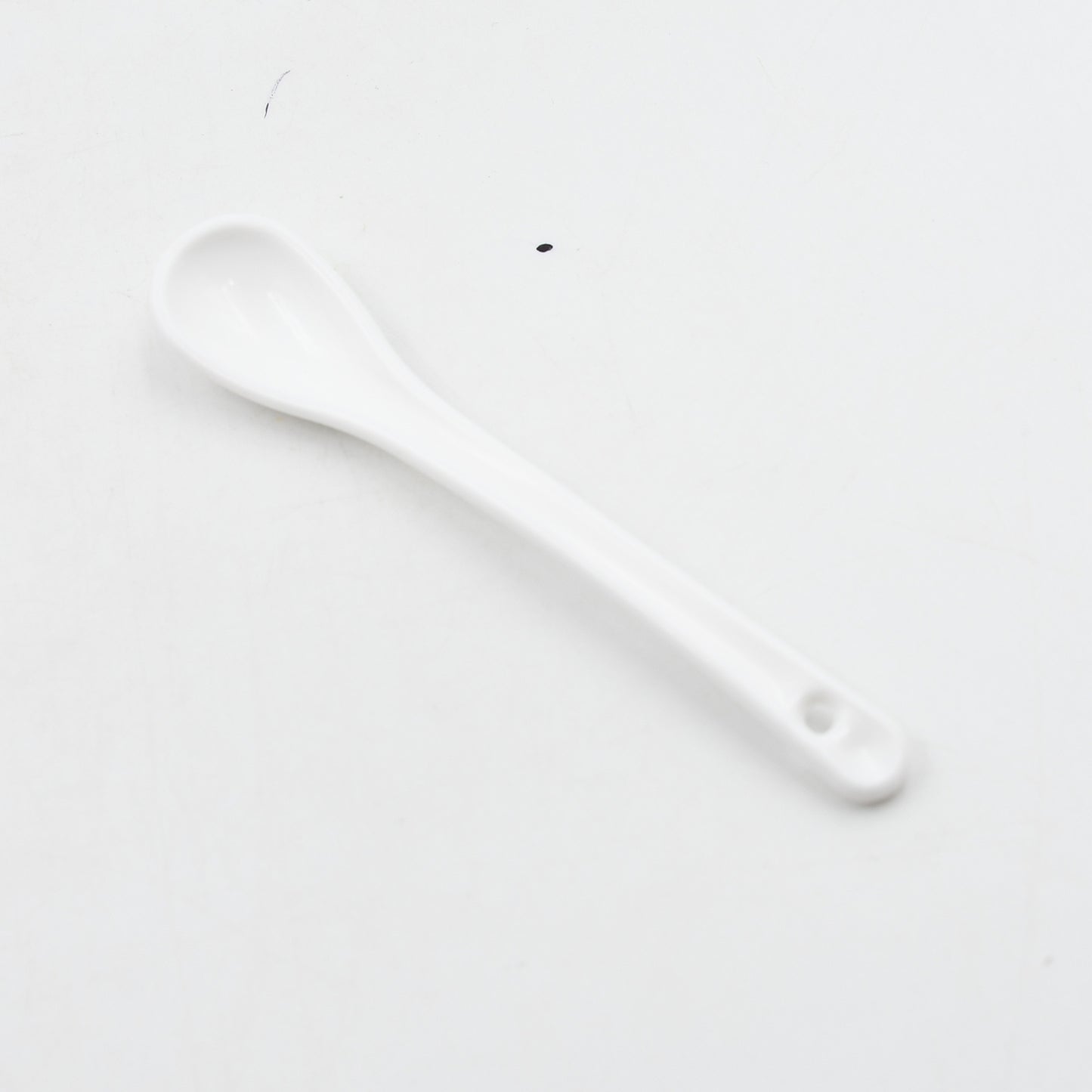 High-quality coffee mug with spoon, perfect for daily use