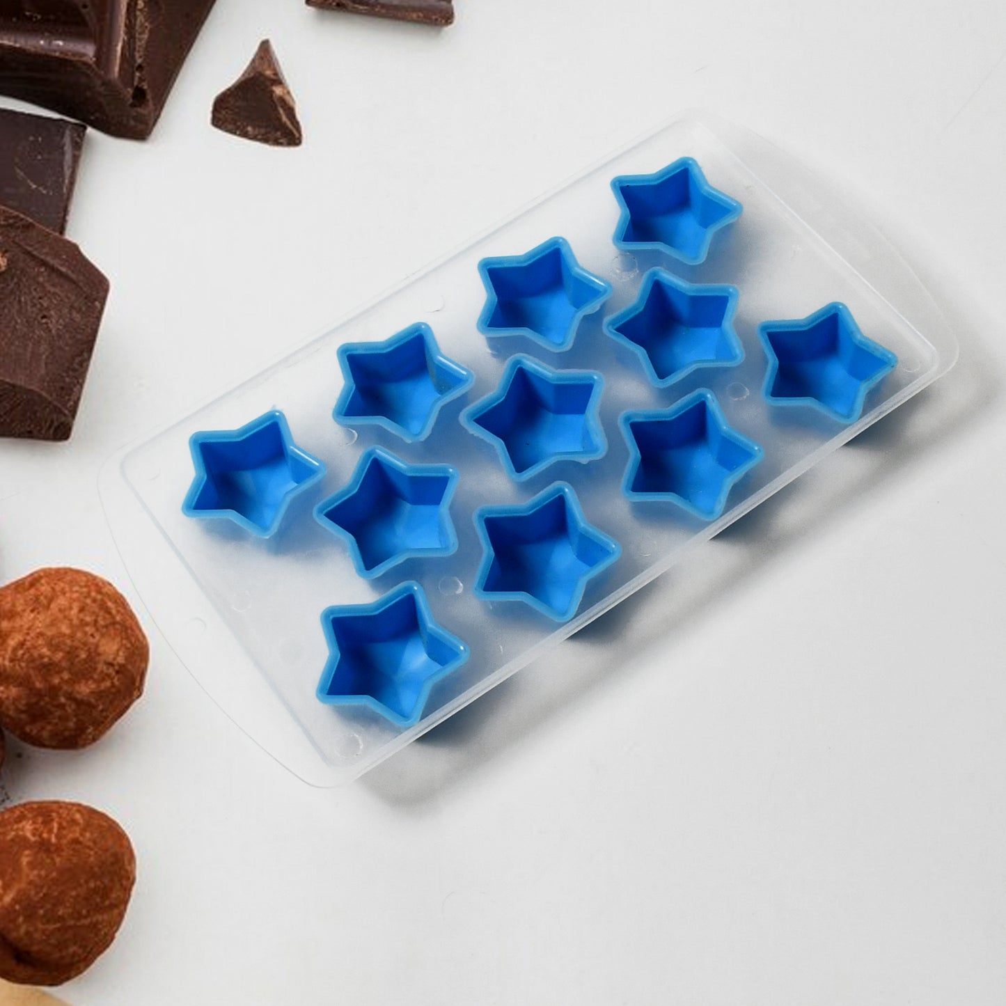 Assorted silicone mold with star, heart, and other fun shapes for ice or candy.