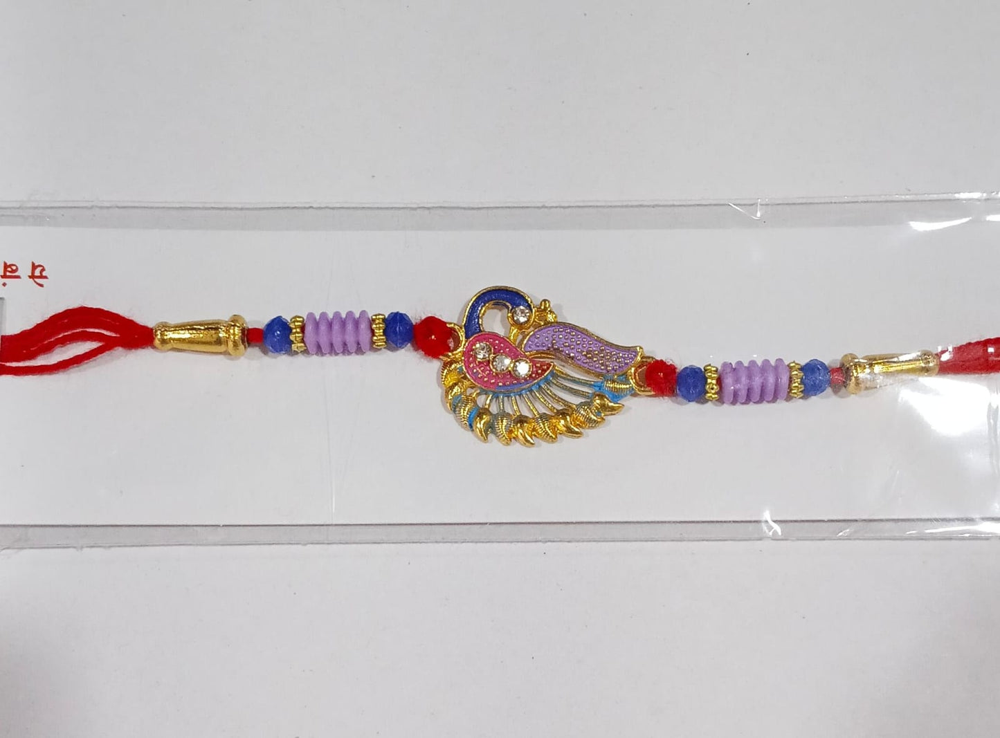 Designer Peacock Rakhi with Beads and Thread Traditional Rakhi (1 Pc)