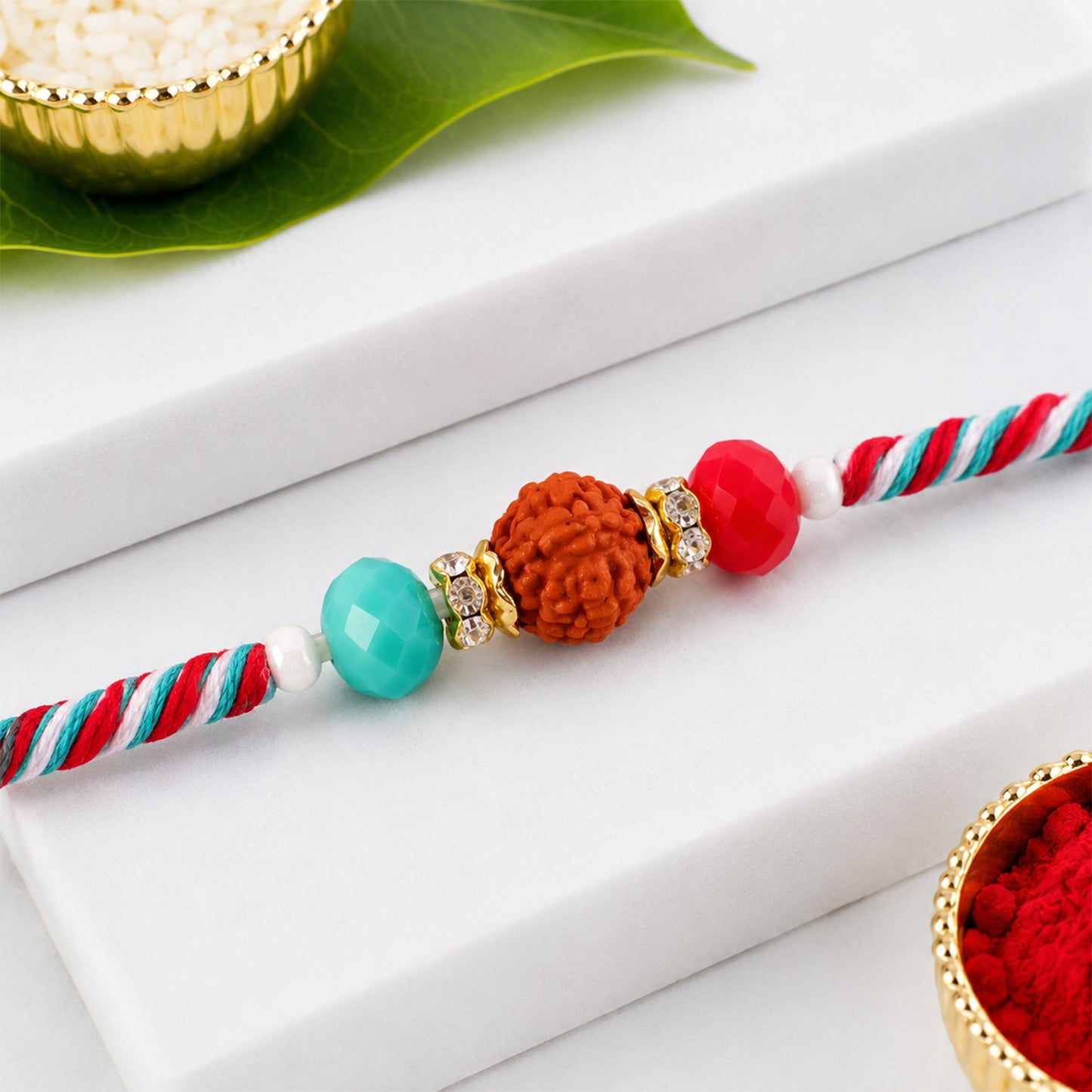 Beautiful Multicolor Designer Rakhi with Golden Centre and Cheerful Raksha Bandhan Style
