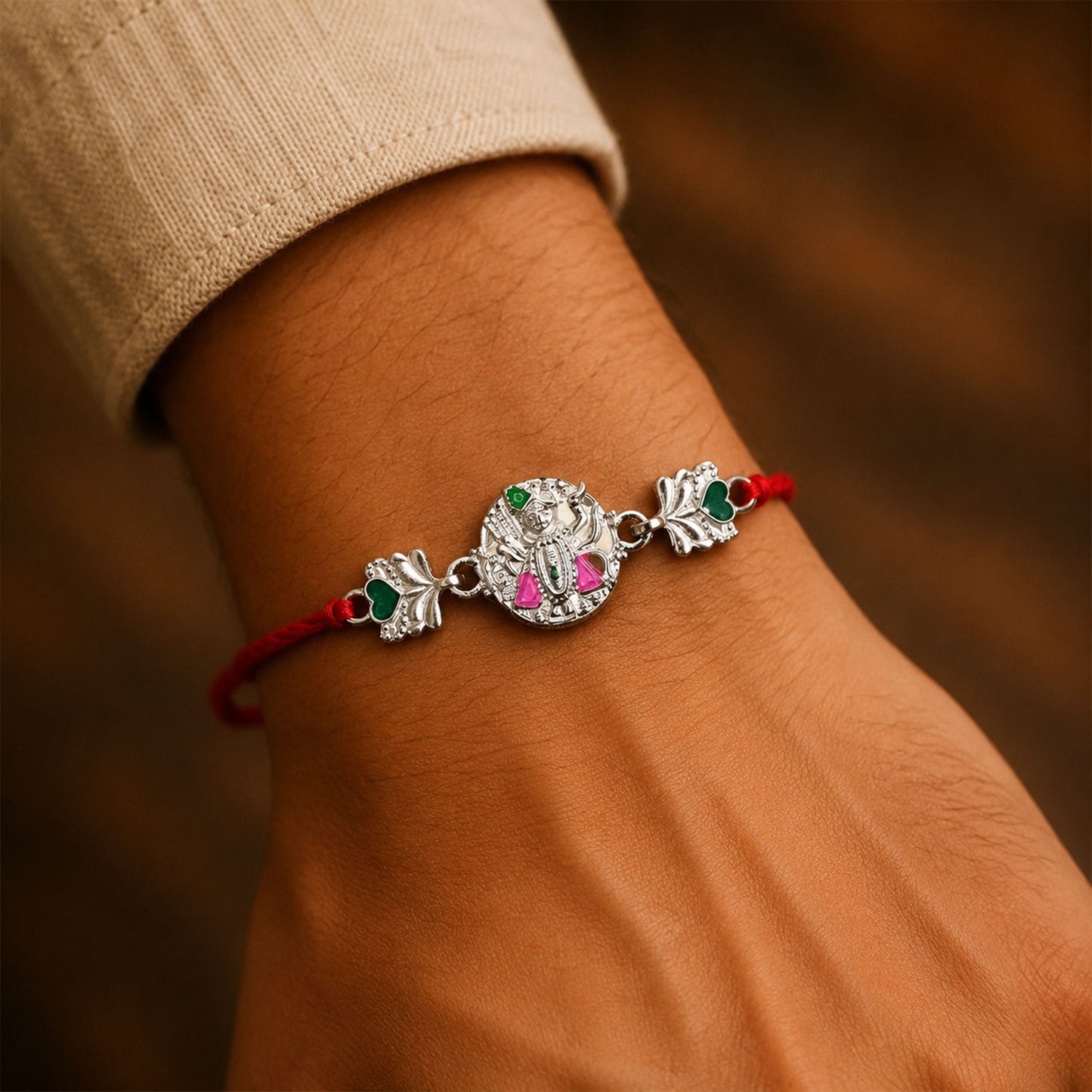 Silver Shrinathji Rakhi with Pink Green Stones and Elephant Charms