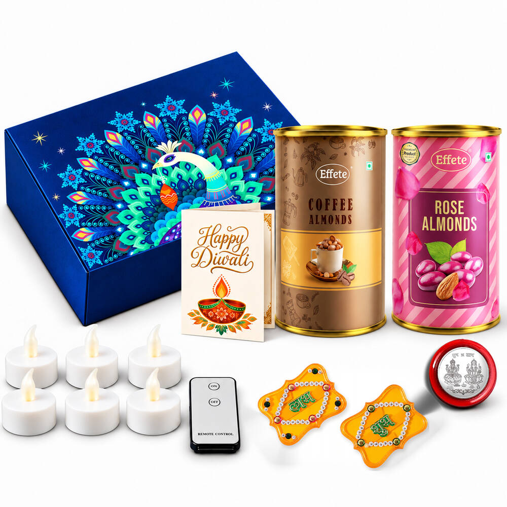 A vibrant blue box with a peacock design, two almond tins, a Diwali card, LED tealights, and decorative items.
