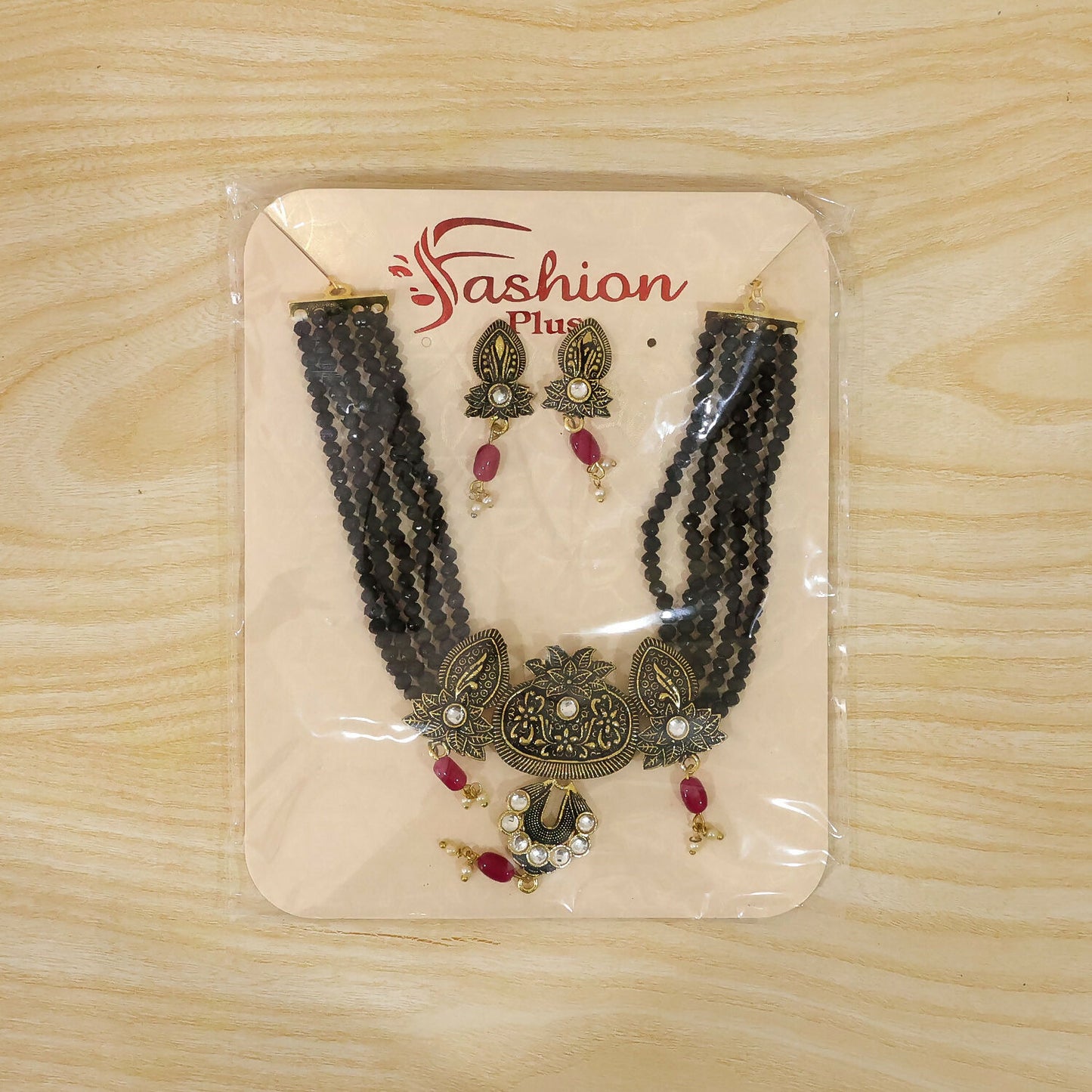 Matching earrings from black beaded necklace set