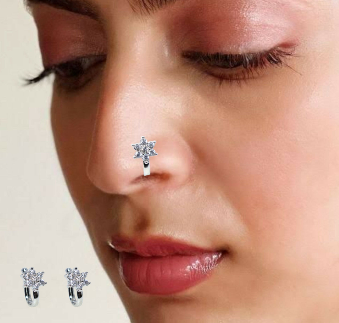 Silver plated non-piercing nose pin with sparkling CZ snowflake design close-up