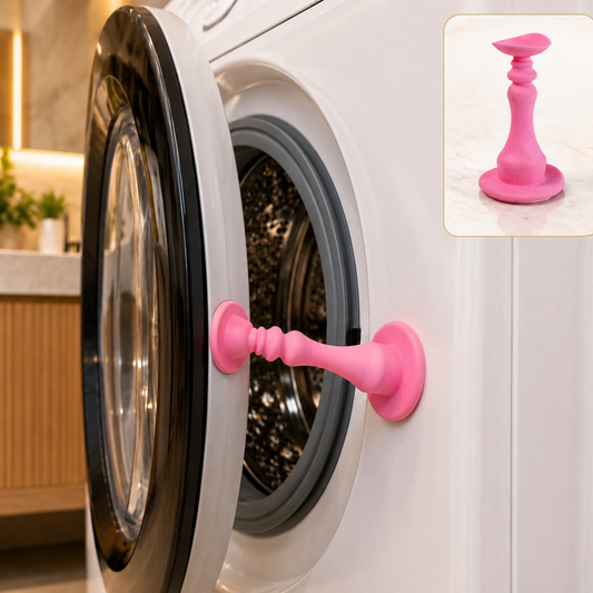 Pink silicone door stopper holding a washing machine door ajar, with a close-up inset of the stopper.