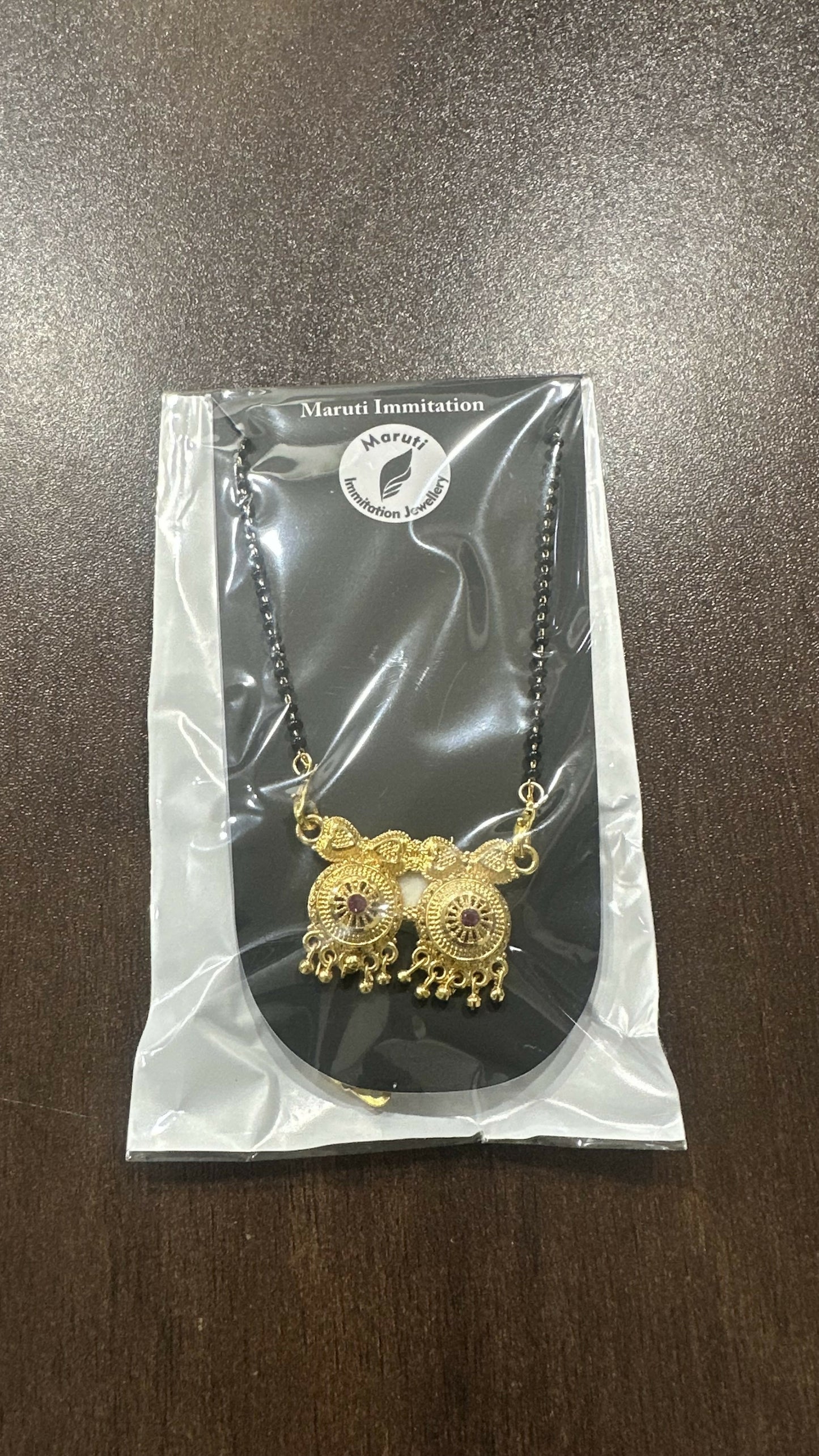 The Couple in Heart Design Magalsutra.