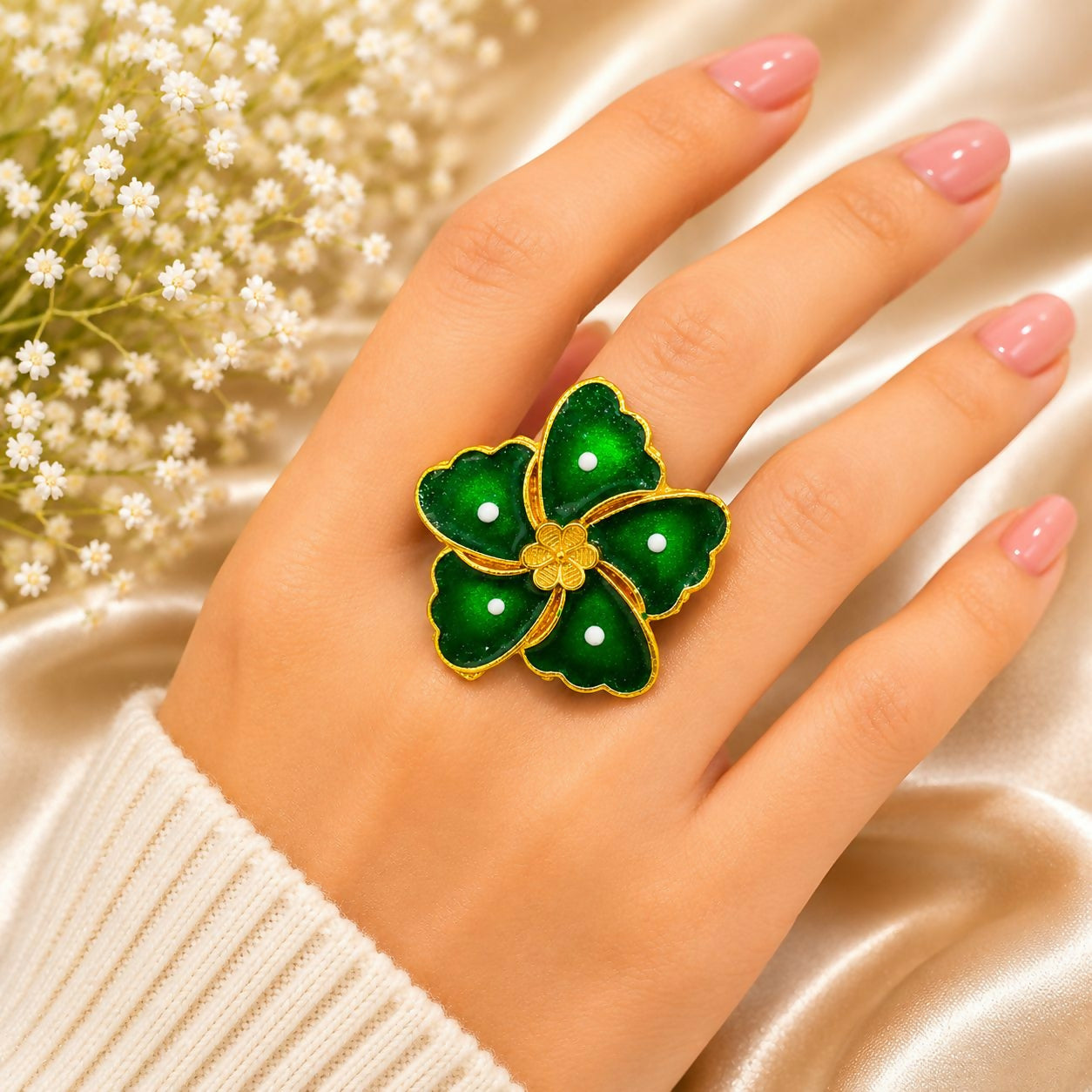 Side view of the green enamel floral ring, showcasing its elegant design.