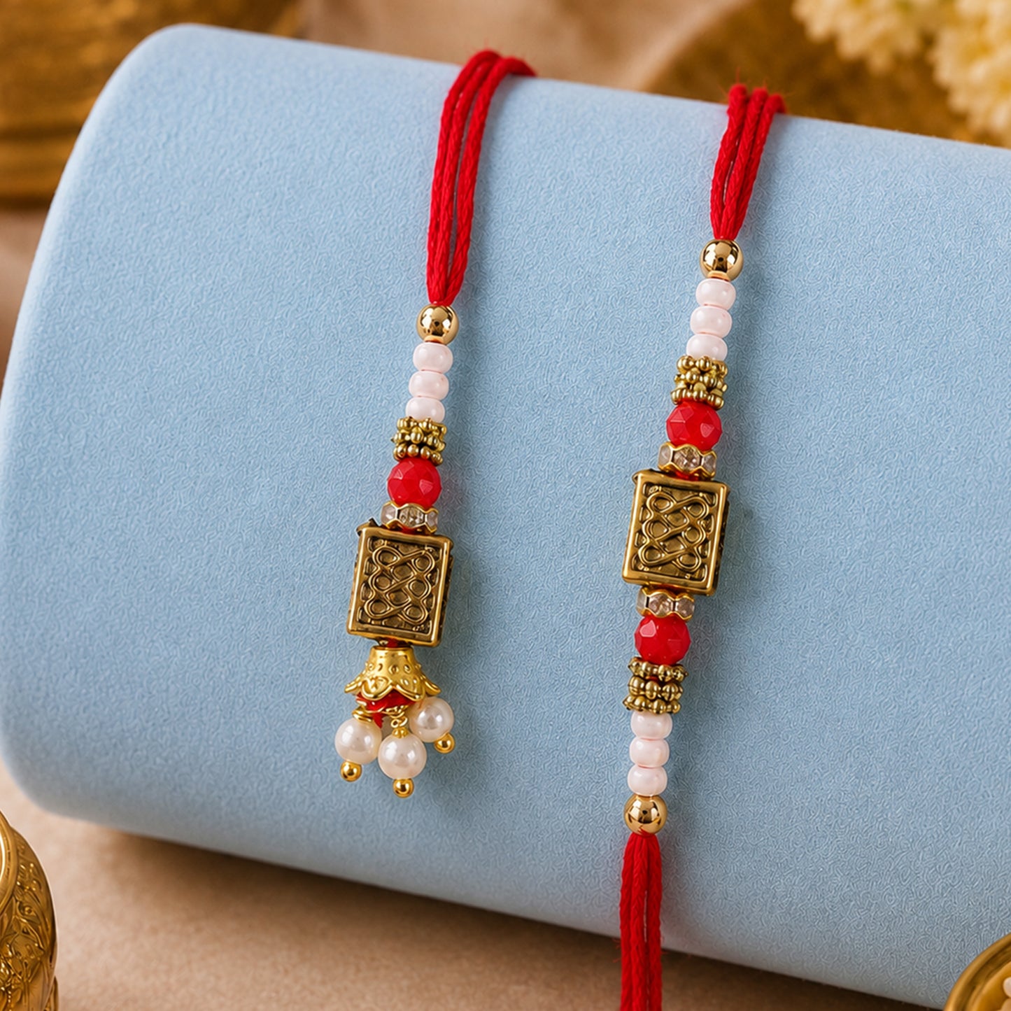 Geometric Rectangle Bhai Bhabhi Rakhi with Rectangular Emblem and Pearls for Gifting