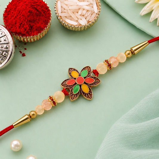 Close-up of vibrant Floral Bead Rakhi featuring colourful beads and intricate floral patterns