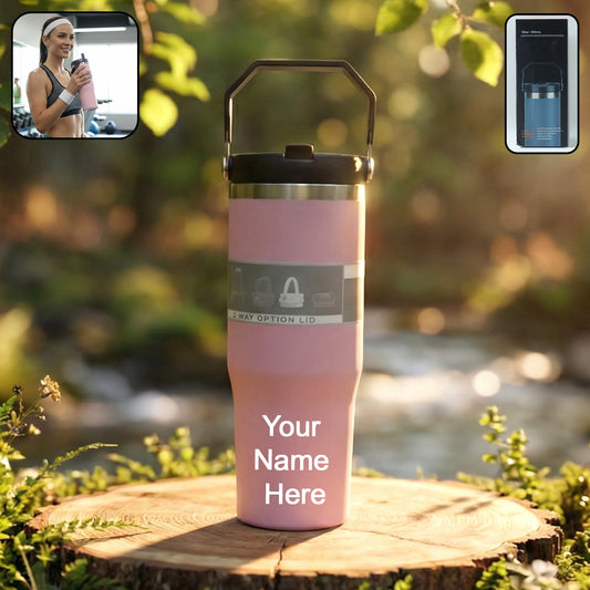 Insulated stainless steel travel tumbler with handle and leak-proof lid suitable for hot and cold drinks.