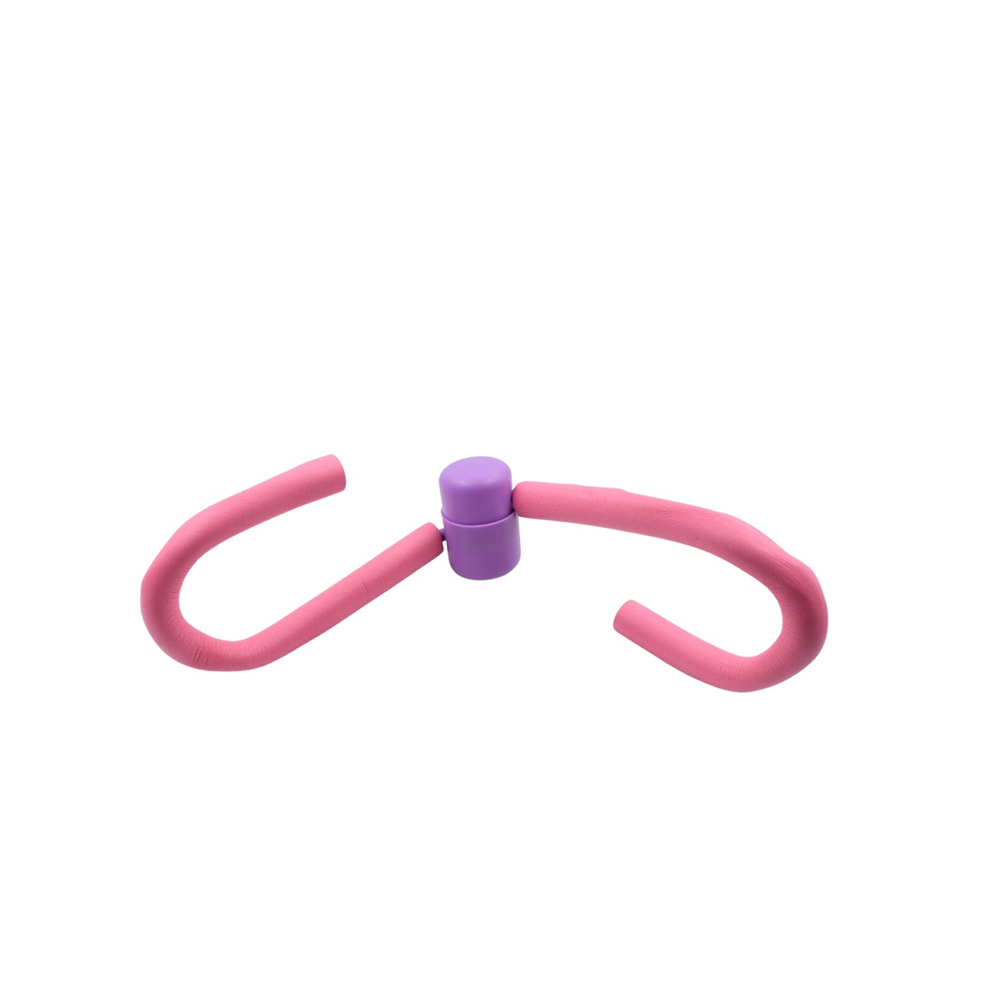 Fitness Thigh Toner next to gym equipment