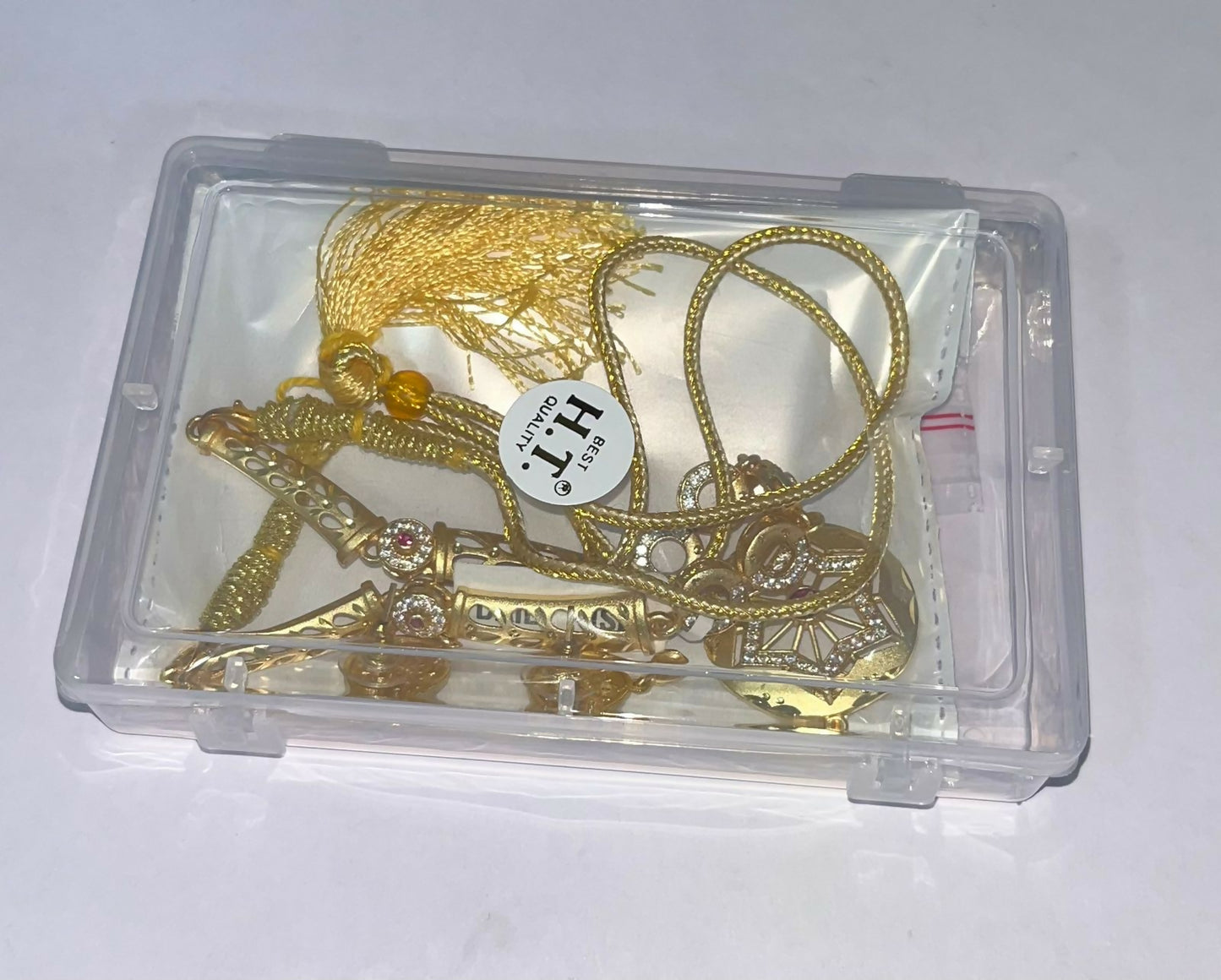 Side view of gold plated bridal necklace set with matching earrings