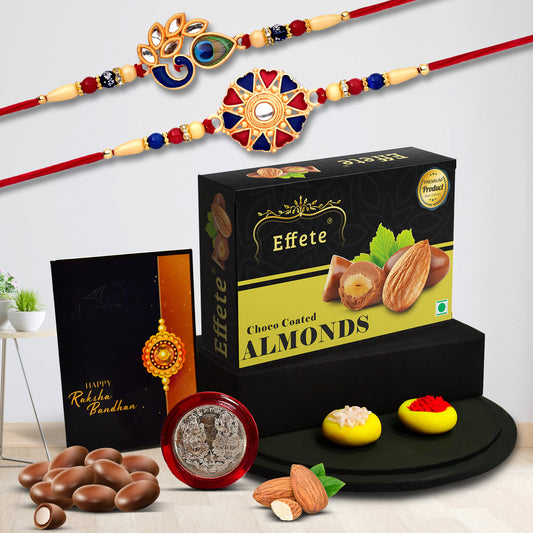 Rakhi gift combo with two premium rakhis and choco coated almonds box