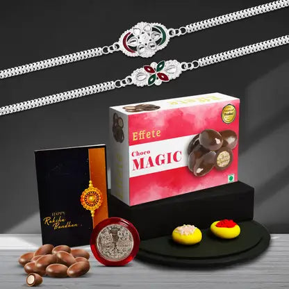Rakhi Gift Combo featuring two elegant rakhis with choco magic and silver coin