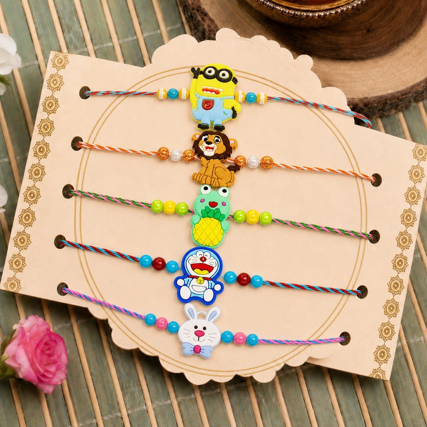 Trendy Charming Rakhi for Brother with Roli Tikka, Pooja Coin & Card, Pack of 8
