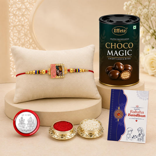 Radha Krishna Rakhi with chocolate, roli chawal, and silver coin for Raksha Bandhan.