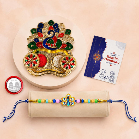 Multicolor peacock bracelet rakhi and peacock shape pooja thali in a Raksha Bandhan combo gift set.