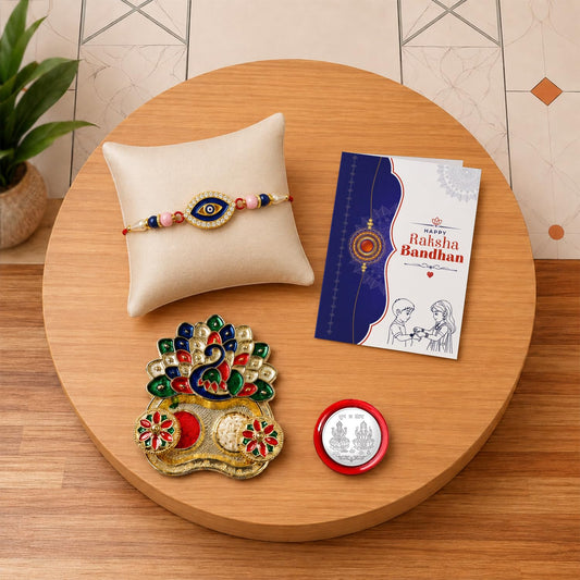 Complete Rakhi Gift Hamper for Raksha Bandhan featuring an evil eye bracelet rakhi and peacock pooja thali.
