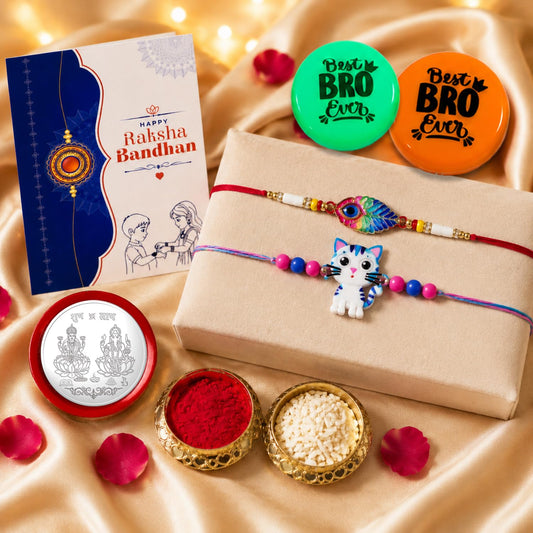 Peacock design Raksha Bandhan rakhi combo with decorative magnets, roli chawal, and silver coin.