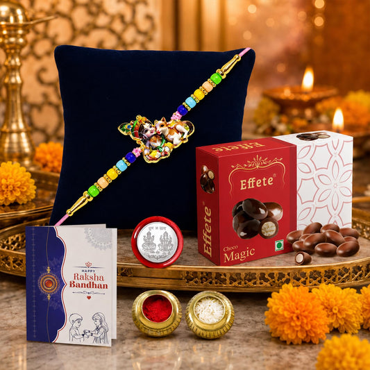 Rakhi with chocolate for brother Raksha Bandhan gift combo including silver coin and roli chawal.