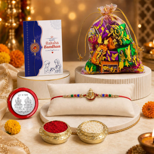 Deity multicolor Raksha Bandhan gift combo for brother with chocolate and coin.