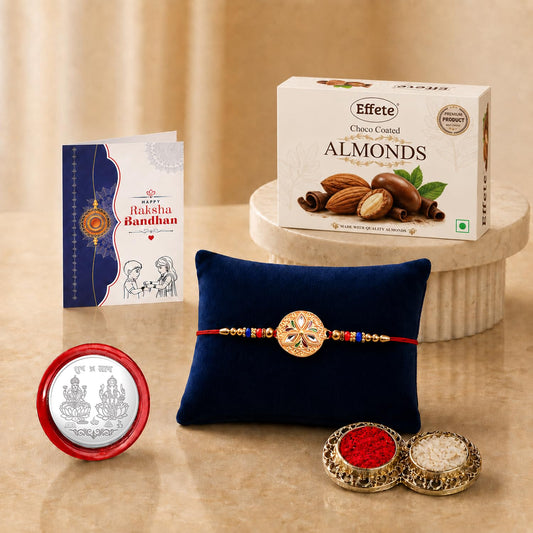 Full view of the Raksha Bandhan combo gift set with rakhi, chocolate, roli chawal, silver coin, and greeting card.