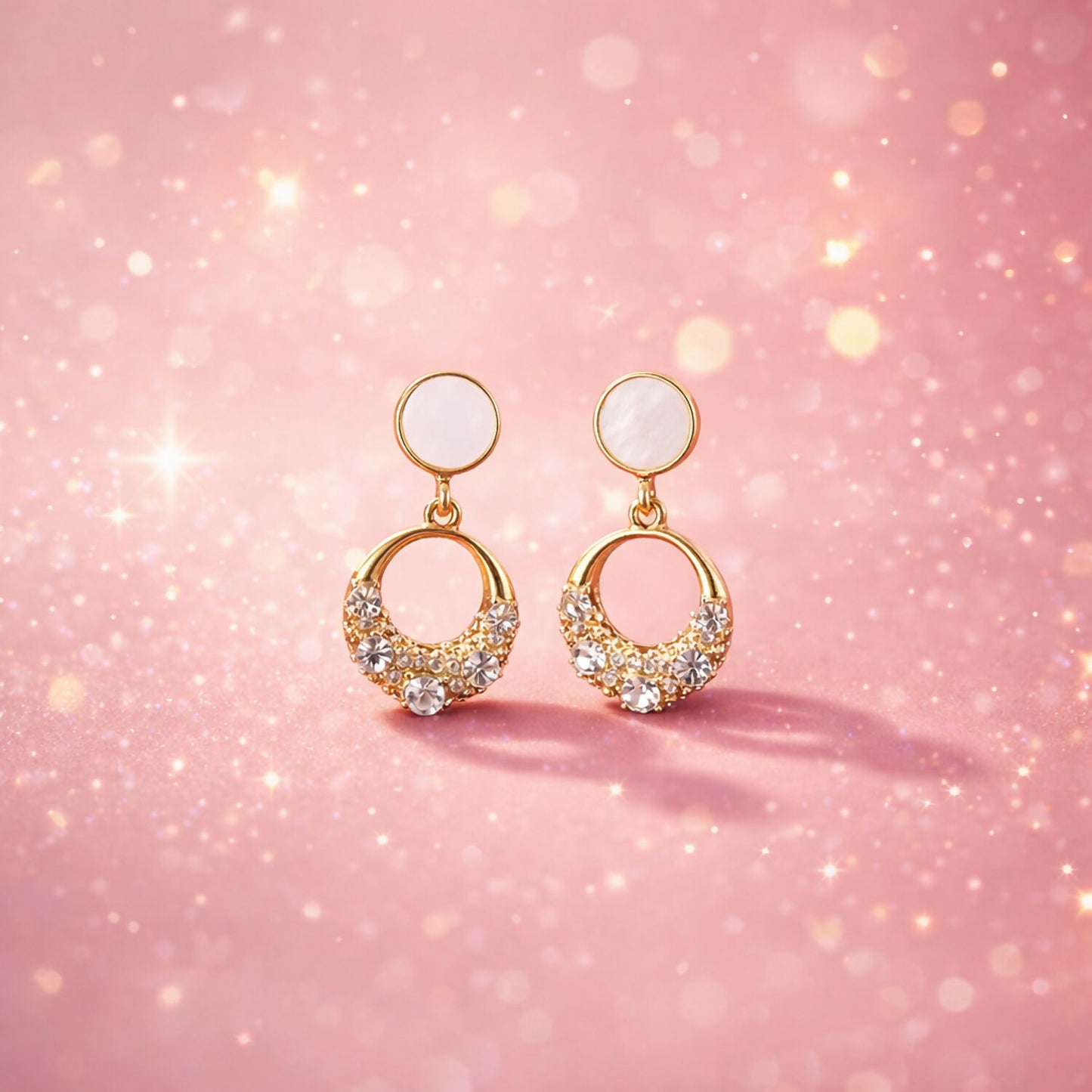 Gold round crystal drop earrings with pearl top, front view