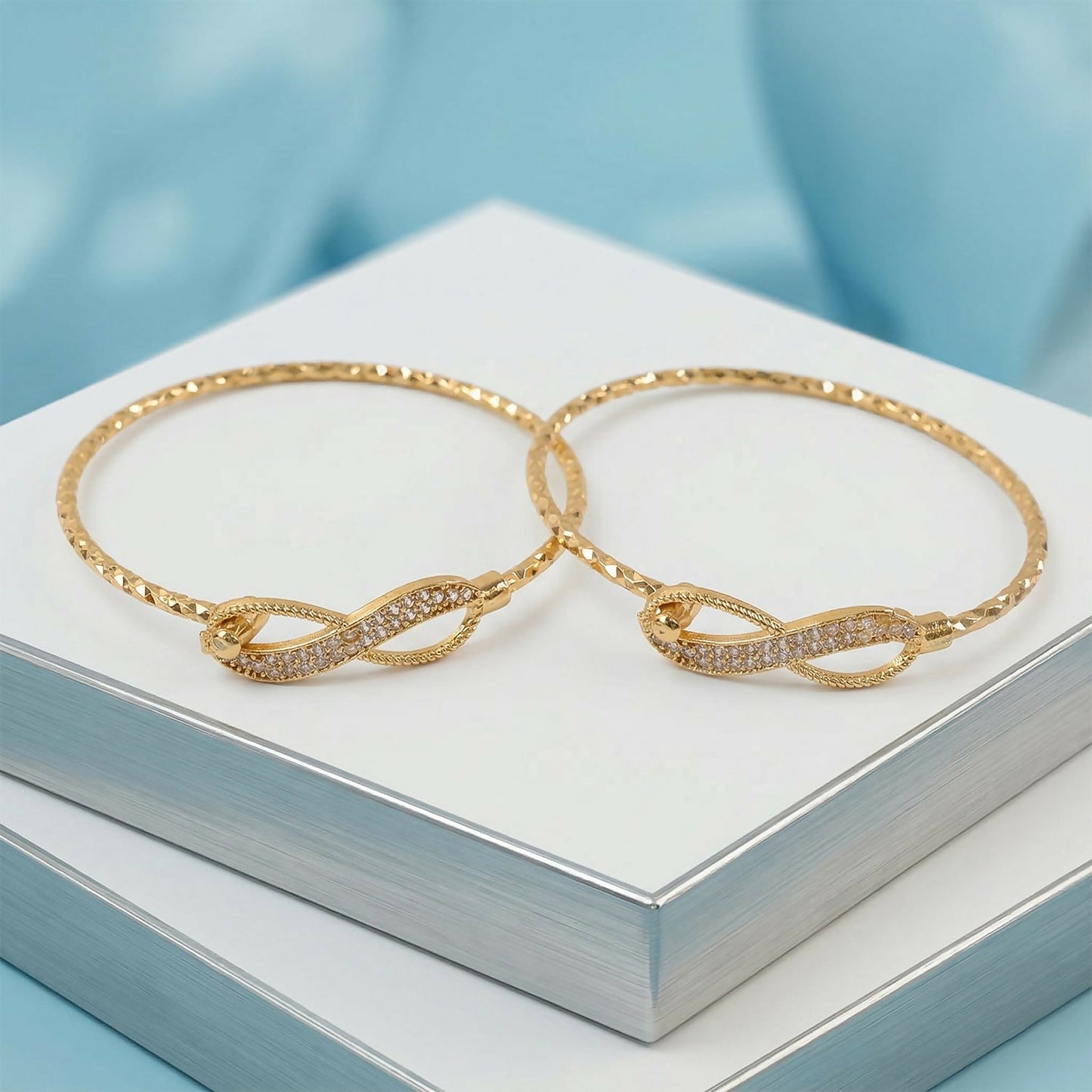Side view of textured gold finish on infinity bracelet